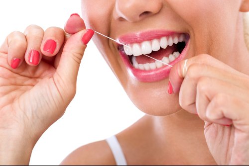 Floss daily for healthy teeth and gums